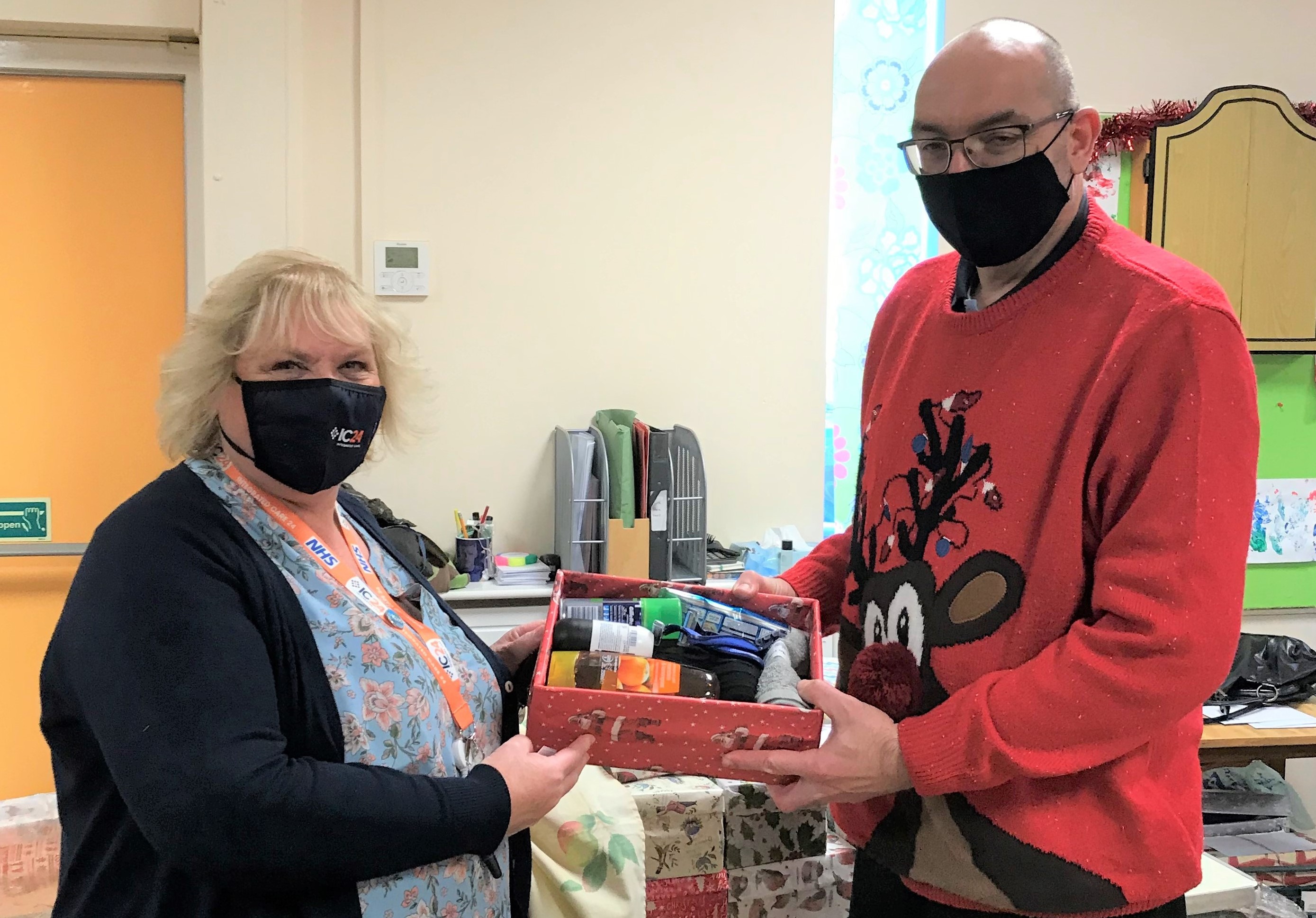 Eastbourne Station Health Centre team donates Christmas funds to The Salvation Army - IC24